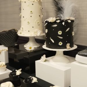 Custom tall layered cake by Seattle Bakeshop, serves 12-15 people.